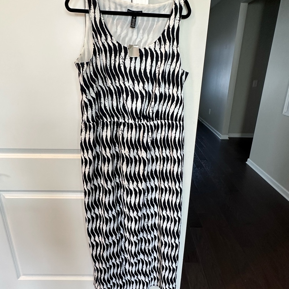 This is a floor length new with tags Chicos dress